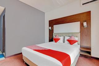 Hotel O near RSUD Arifin Achmad formerly Damon Butik Hotel - 5