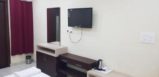 Hotel Teeja's - Haldi Restaurant Aiims road Jodhpur - 1