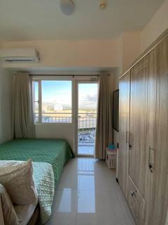 Cozy 1 BR Apartment At South Residences Tower 2 - Manilla - 8