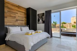 Hygge Holiday Home with Large Communal Pool and Private Hot Tub - Xagħra - 1