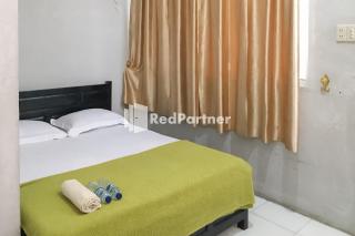 Aquino Marito Homestay Mitra RedDoorz - 5