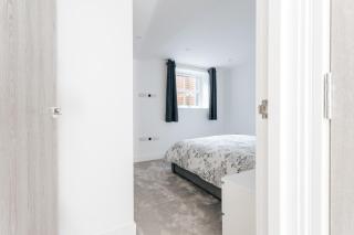 Contemporary Two Bedroom Duplex - Secluded Residence with Parking in a Prime Central Location - 2