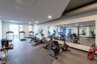 Modern 1BR Apt with Skywalk to Fiserv, Rooftop, and Parking - 1