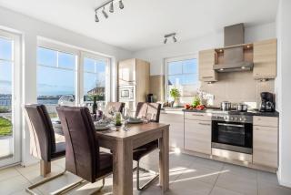 Beach House - Sonnenterasse, Wellnessbad mit Sauna, Kamin, Dachterrasse, Hafenblick - Olpenitz - 0
