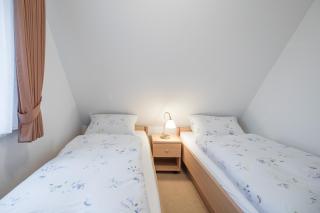 Direkt am Deich - Ferienwohnung Oland im Gästehaus Am Badedeich - Dagebüll - 5