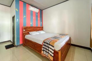 Ekas Beach Guesthouse Mitra RedDoorz - Ekas - 8