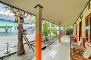 Ekas Beach Guesthouse Mitra RedDoorz - Ekas - 4