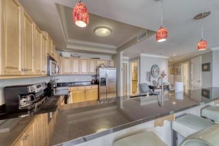 Holiday Isle Unit 122 - Ground Floor Corner Unit - Wrap around balcony - extra large floor plan! condo - Dauphin Island - 1