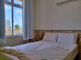 2 QUARTOS em CONDOMÍNIO TRANQUILO com PISCINA Estacionamento coberto – PARQUINHO para CRIANCAS - Cozinha Completa, VENTILADO, nascente, AR CONDICIONADO – 800m da praia do PORTO DAS DUNAS e BEACH PARQUE - Ceará - 5