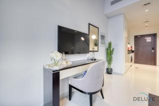 Sunlit Studio at Golf Promenade 2A DAMAC Hills By Deluxe Holiday Homes - Dubai - 1
