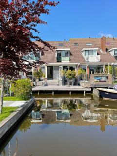 Guesthouse BedNboot met terras aan het water - Rijpwetering - 1