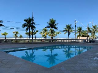 Apartamento frente ao mar com varanda e piscina - Praia Grande - 9