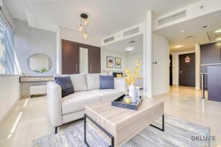 Affordable Luxury Modern 1BR with Pool & Balcony by Deluxe Holiday Homes - Dubai - 9