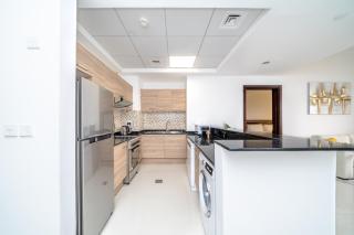 ALH Vacay - One Bedroom in Canal Residence West Spanish Sports City - Dubai - 7