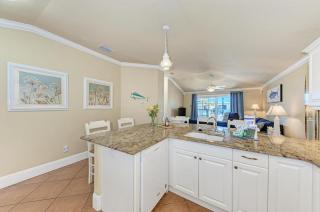 Sand Dollar: Poolside Condo 2 Blocks to Beach by Anna Maria Life Vacation Rentals - 1
