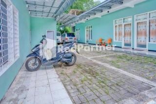 Griya Rahayu Guesthouse Mitra RedDoorz near Jatim Park 2 Batu - 5