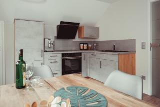 Exklusive Ferienwohnung an der Mosel - Top Ausstattung - Dachterrasse - E-Ladestation - Netflix - 5