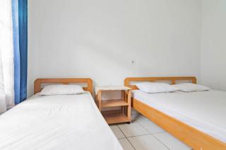 Pall Inn Puncak Mitra RedDoorz - 8