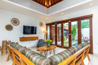 Villa Kamboja Premium walk to double six Beach - enclosed living room with AC - 1