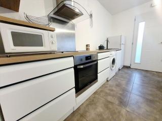 F2 neuf calme climatisé wifi parking - 1,5 km mer - 7