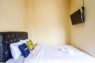 Urbanview Hotel Telu Wolu Monjali by RedDoorz - Kejayan - 3