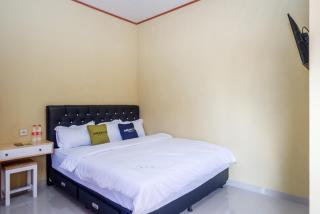 Urbanview Hotel Telu Wolu Monjali by RedDoorz - Kejayan - 0