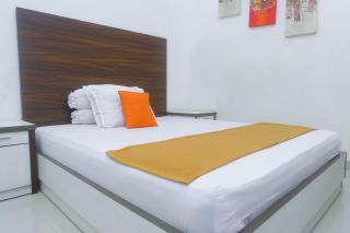 Lia Homestay Syariah Pettarani Makassar Mitra RedDoorz - Makassar - 9