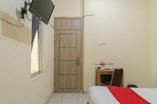 RedDoorz @ Jalan Kolonel Haji Burlian Palembang 2 - Talang Kelapa - 7