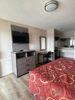 Garden Inn & Suites - 5