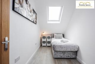 Modern Escape in 1 or 2BR Apartments with Parking - 5