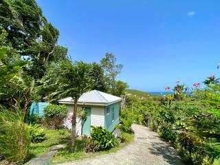 Le Surf Lodge, chambre avec vue mer dans un écrin de verdure - Deshaies - 8