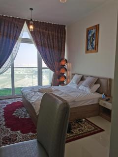 Heaven Escape surrounded by stunning golf view High floor -Netflix-GYM-pool -perfect vacations - Dubai - 4