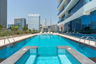 Exclusive GLOBALSTAY Apartments in Business Bay Free Parking & More! - Dubai - 0