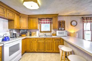 Scenic Lyman Home on Swan Pond with Wraparound Deck! - Spang Mills - 2
