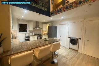 80s RETRO 3 Bedroom Apartment in Wimbledon London Sleeps 6! NETFLIX WIFI and Arcade! Perfect for Families Business & Leisure Guests! - Londra - 7