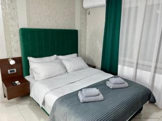 Pink House Apartments - 1