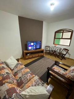 Casa aconchegante à 400m da Praia da Tartaruga - Ar condicionado - WIFI 450MB - Netflix - Cozinha Completa - Garagem - Rio das Ostras - 4
