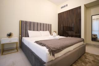Elite LUX Holiday Homes - Modern One Bedroom Apartment in MAG 5, Dubai South - 1