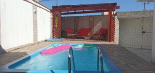 "Excelente Casa Pé na Areia com Opção de Piscina Aquecida Cobrado á Parte, Ampla Área de Lazer, Deck Coberto com Churrasqueira e Cooktop, Cozinha Americana, Ampla Sala de Estar com Lindíssima Lareira, Smart TV 50", WI-FI e o Melhor fica Pertinho da Praia" - 4