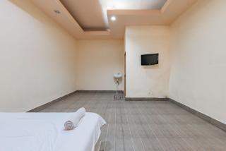 Urbanview Hotel Garuda Sky Inn Balikpapan by RedDoorz - Stalkudo - 1
