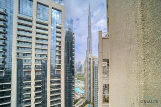 Harmonious 1BR at 29 BLVD Tower 1 Downtown Dubai by Deluxe Holiday Homes - 4