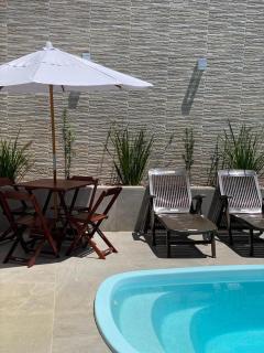 Casa com piscina e um quarto com ar split pé na areia a 50 metros da praia - 9