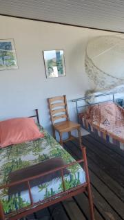 Sweet Mini Dortoir sur notre terrasse couverte pour vos transits entre deux vols by Kohutahia Lodge, 7 min by car to airport and town - 1