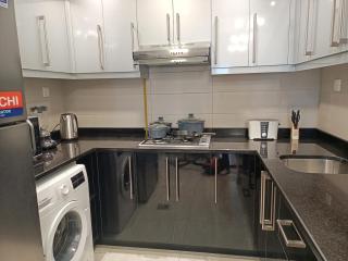 Cityscape Serenity Apt with Skyline & Stable View - 5