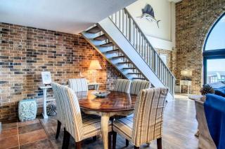 Floor to Ceiling Arched Window Panoramic View of the Coast in This Split Level Penthouse - Port Aransas - 6