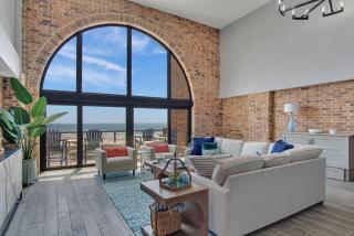 Split Level Pentouse with Floor to Ceiling Arched Window and Panoramic View of the Coast - Port Aransas - 0