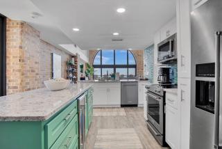 Split Level Pentouse with Floor to Ceiling Arched Window and Panoramic View of the Coast - Port Aransas - 8