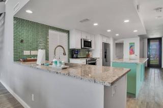 Split Level Pentouse with Floor to Ceiling Arched Window and Panoramic View of the Coast - Port Aransas - 6
