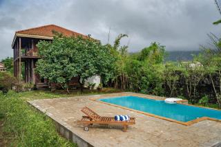 SaffronStays Boulevard LogHouse - a wooden chalet amidst nature - Kārli - 0