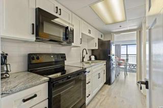 Immaculate Ocean Front Condo With Fireplace! 1BR King Suite - Sleeps 6! - Caribbean Resort 427 - 1